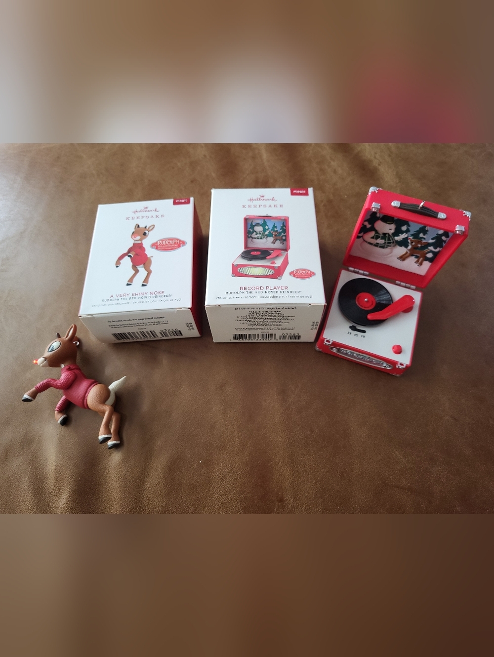 1) Hallmark Keepsake Ornament (Shiny Nose Rudolph) & 1) Rudolph Record Player